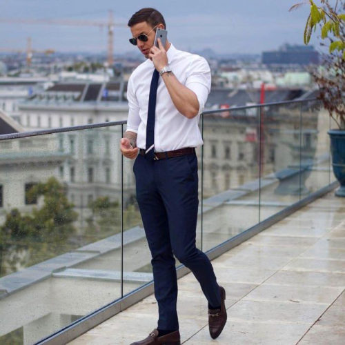 Classic Look: Crisp White Shirt, Navy Suit Pants And A Navy Tie